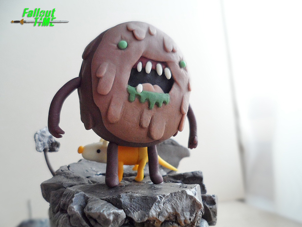 Adventure Time в антураже Fallout.
Из материалов использовал цветную пластику, проволоку и акриловую краску. Высота Финна 100 мм, Джейка Пса – 40 мм....